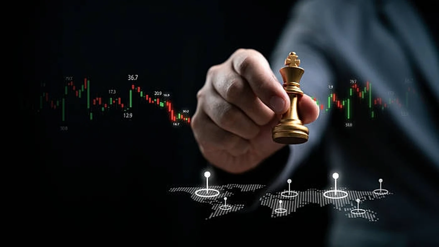 A hand positions a golden chess king above a candlestick market chart and a world map dotted with location markers.